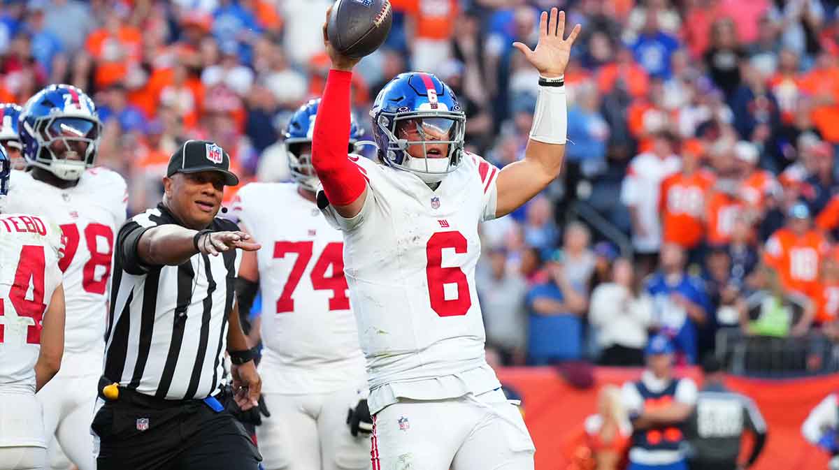 New York Giants quarterback Jaxson Dart (6) reacts after a play against the Denver Broncos at Empower Field at Mile High.