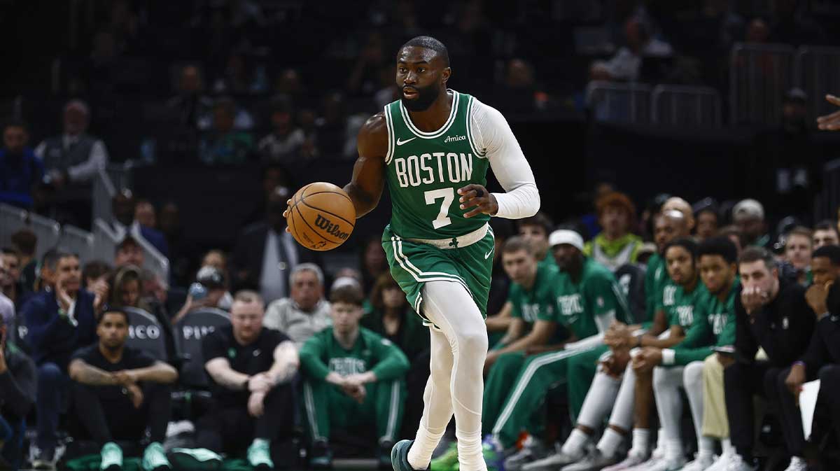 Boston Celtics guard Jaylen Brown (7) brings the ball up the court against the Philadelphia 76ers during the second half at TD Garden.