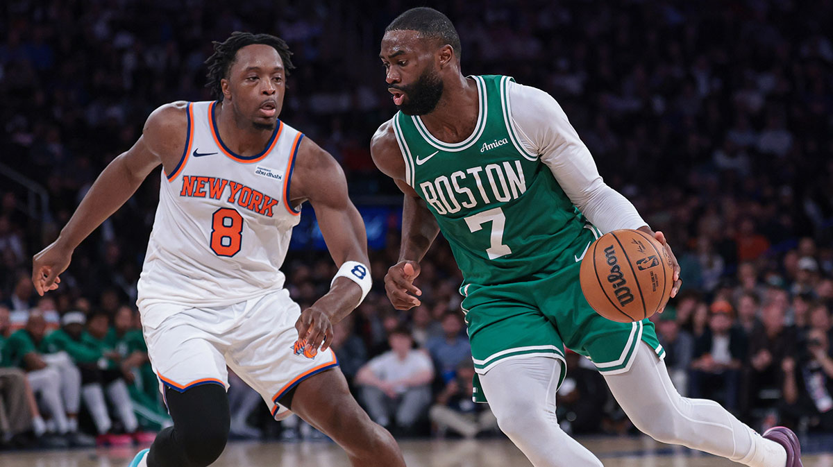 Boston Celtics guard Jaylen Brown (7) dribbles against New York Knicks forward OG Anunoby (8) during the fourth quarter at Madison Square Garden.