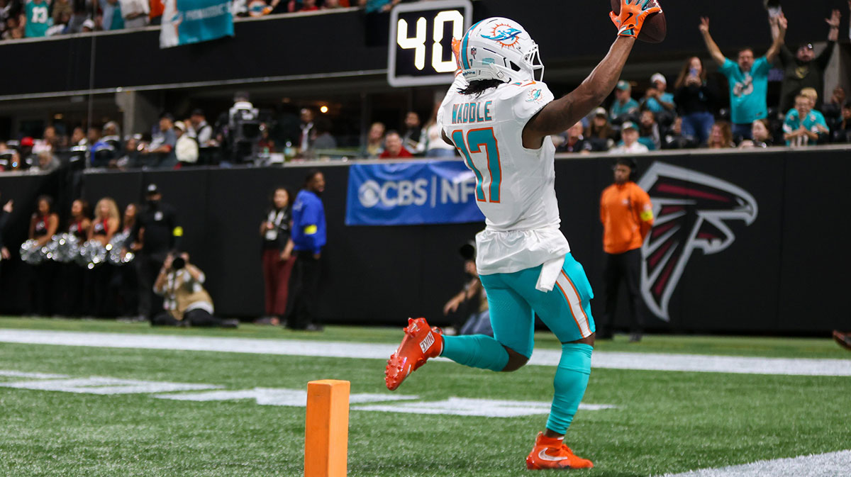 Miami Dolphins wide receiver Jaylen Waddle (17) scores a touchdown against the Atlanta Falcons in the third quarter at Mercedes-Benz Stadium.