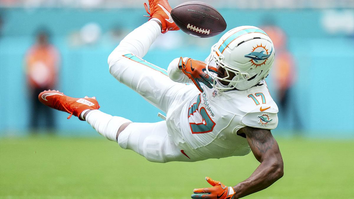 Miami Dolphins wide receiver Jaylen Waddle (17) juggles a ctach against the Los Angeles Chargers during the second quarter at Hard Rock Stadium. 