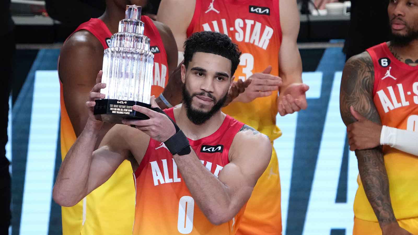 Team Giannis forward Jayson Tatum (0) holds the Kobe Bryant MVP Trophy after the 2023 NBA All-Star Game at Vivint Arena.