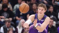 Jazz forward Lauri Markkanen (23) advances