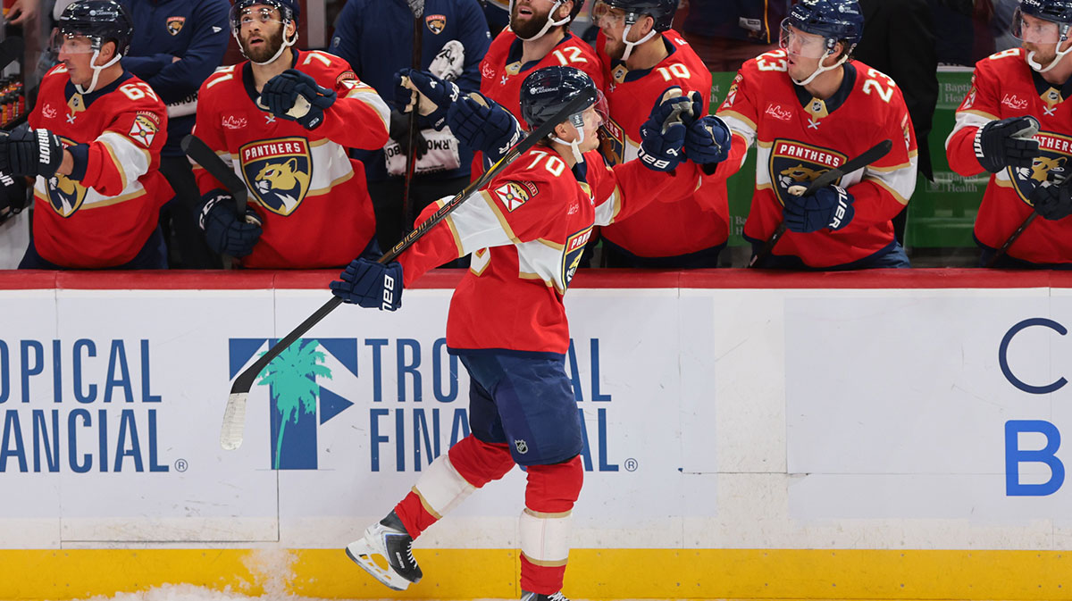 Florida Panthers center Jesper Boqvist (70) celebrates with teammates after scoring against the Chicago Blackhawks during the third period at Amerant Bank Arena.