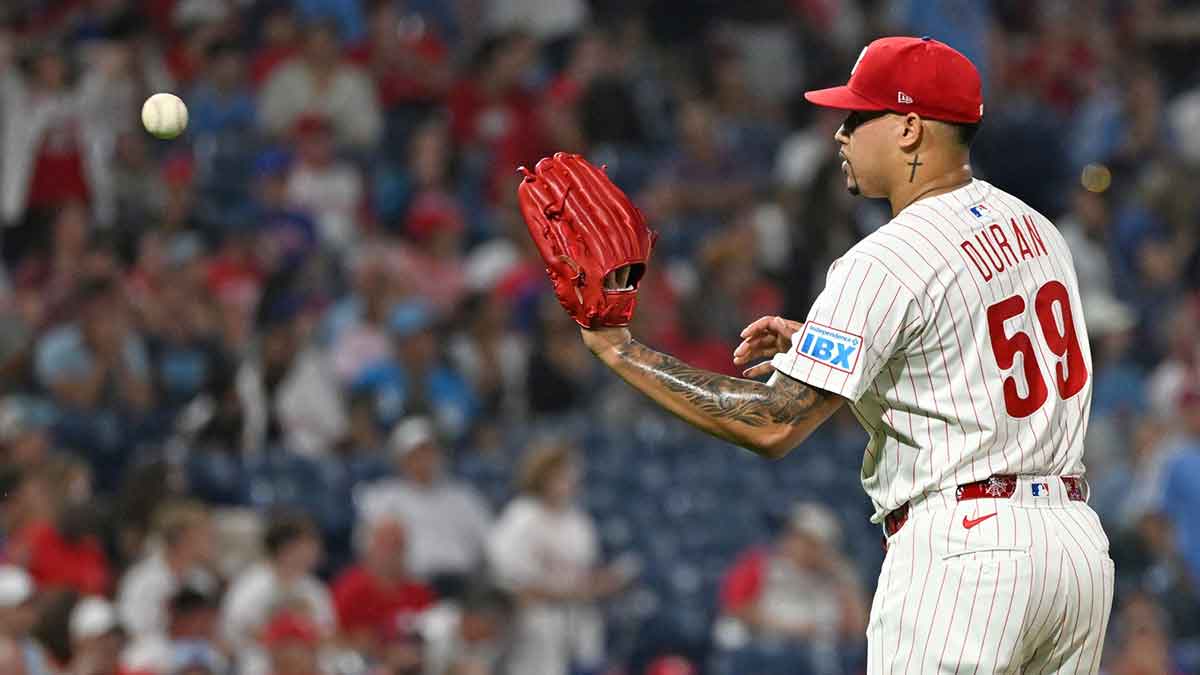 Philadelphia Phillies pitcher Jhoan Duran (59) gets a new baseball after allowing game-tying home run during the ninth inning against the Miami Marlins at Citizens Bank Park.