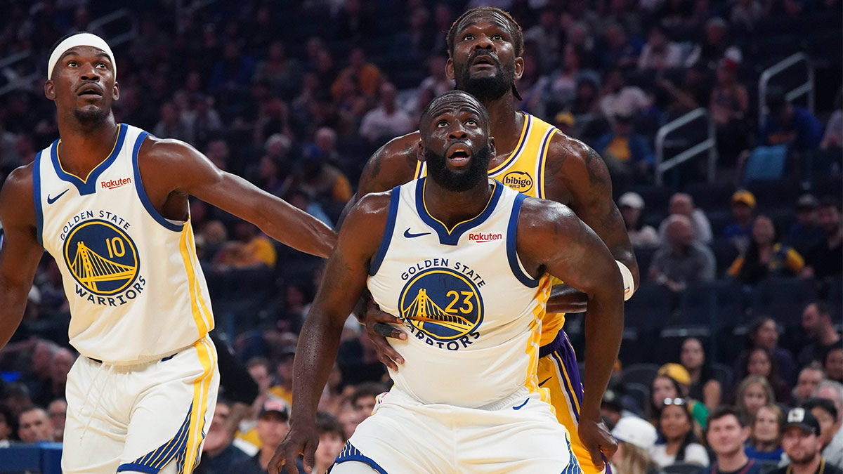 Golden State Warriors forward Jimmy Butler III (10) and forward Draymond Green (23) box out Los Angeles Lakers center Deandre Ayton (5) in the first quarter at Chase Center.