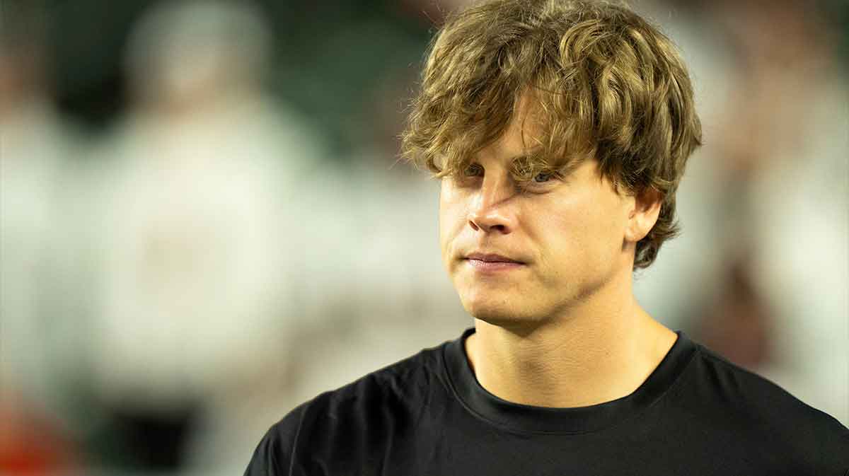Cincinnati Bengals quarterback Joe Burrow (9) walks onto the field
