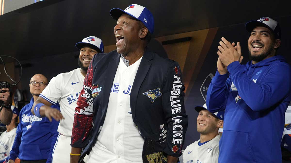 Toronto Blue Jays former player Joe Carter wears the home run jacket in the dugout before game two of the 2025 MLB World Series against the Los Angeles Dodgers at Rogers Centre.