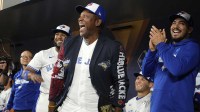 Toronto Blue Jays former player Joe Carter wears the home run jacket in the dugout before game two of the 2025 MLB World Series against the Los Angeles Dodgers at Rogers Centre.