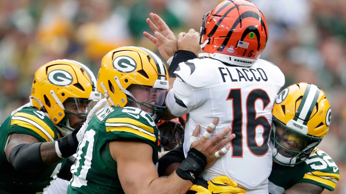 Green Bay Packers defensive end Micah Parsons (1), defensive end Lukas Van Ness (90) and defensive end Rashan Gary (52) pressure Cincinnati Bengals quarterback Joe Flacco (16) on Sunday, October 12, 2025, at Lambeau Field in Green Bay, Wis.Green Bay defeated Cincinnati 27-18.