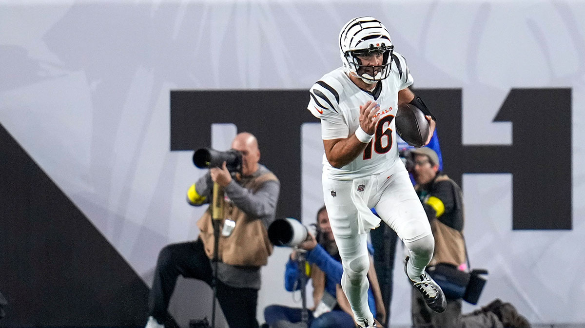 Cincinnati Bengals quarterback Joe Flacco (16) runs for a first down in the fourth quarter of the NFL Week 7 game between the Cincinnati Bengals and the Pittsburgh Steelers at Paycor Stadium in downtown Cincinnati on Thursday, Oct. 16, 2025. The Bengals won, 33-31.