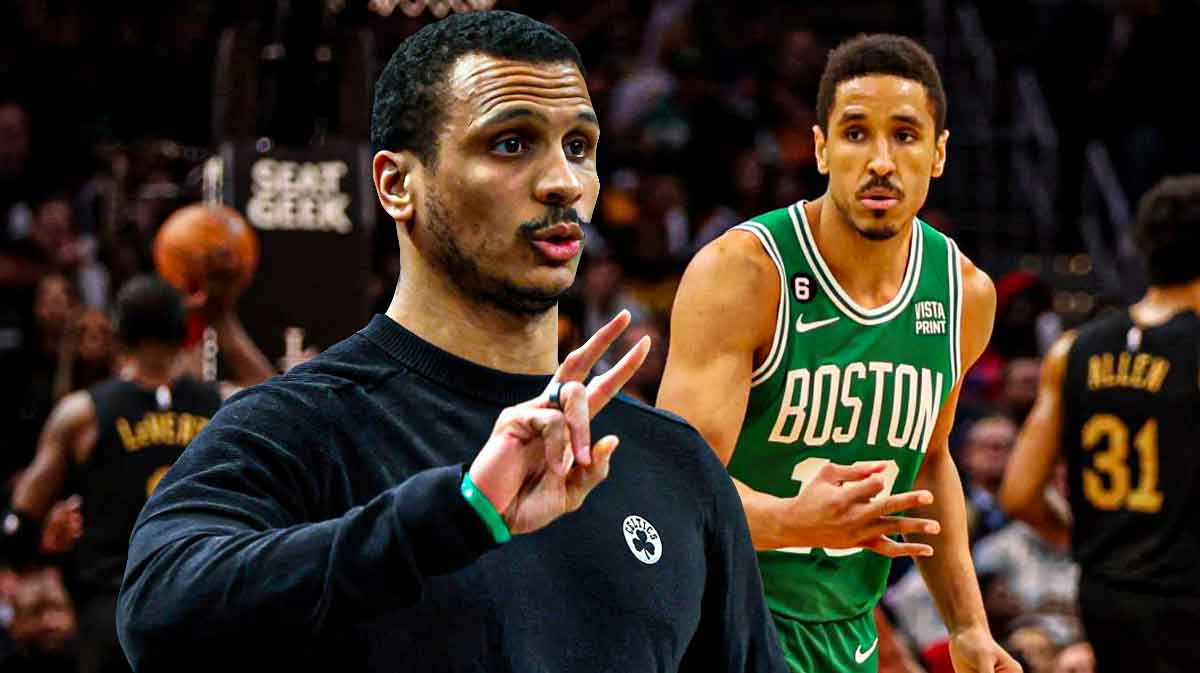 Joe Mazzulla smiling next to Malcolm Brogdon in a Celtics jersey