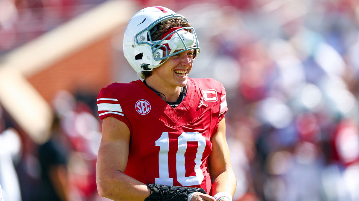 Oklahoma Sooners quarterback John Mateer (10) laughs before the game against the Kent State Golden Flashes at Gaylord Family-Oklahoma Memorial Stadium.
