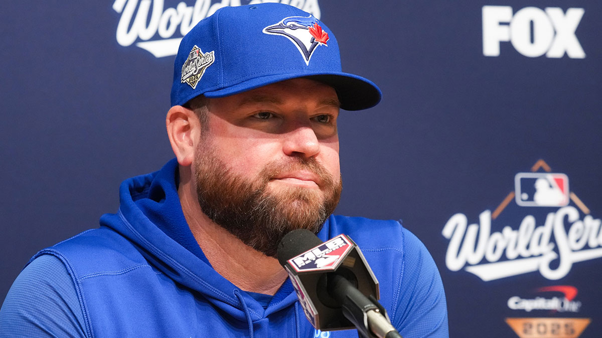 Toronto Blue Jays manager John Schneider (14) speaks at the pregame press conference before game five of the 2025 MLB World Series at Dodger Stadium.