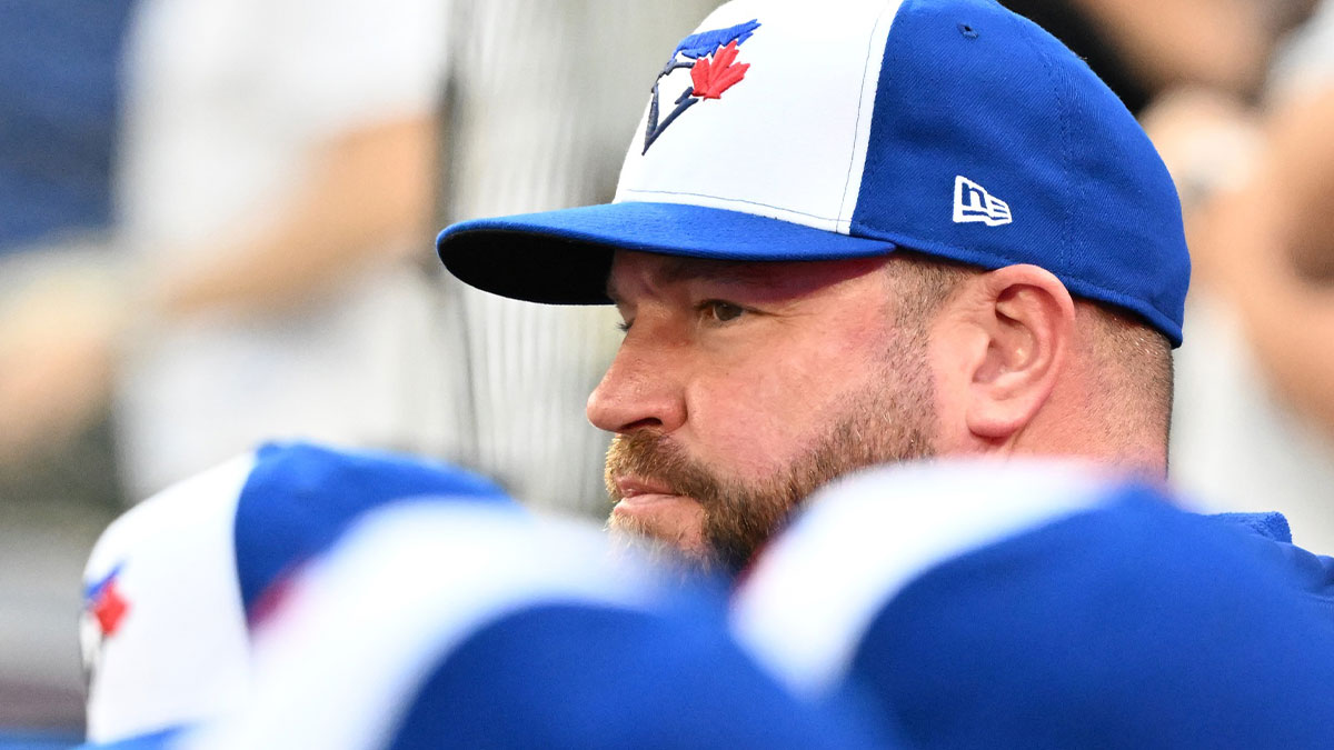 Toronto Blue Jays manager John Schneider (14) watches play against the Tampa Bay Rays in the ninth inning at Rogers Centre.