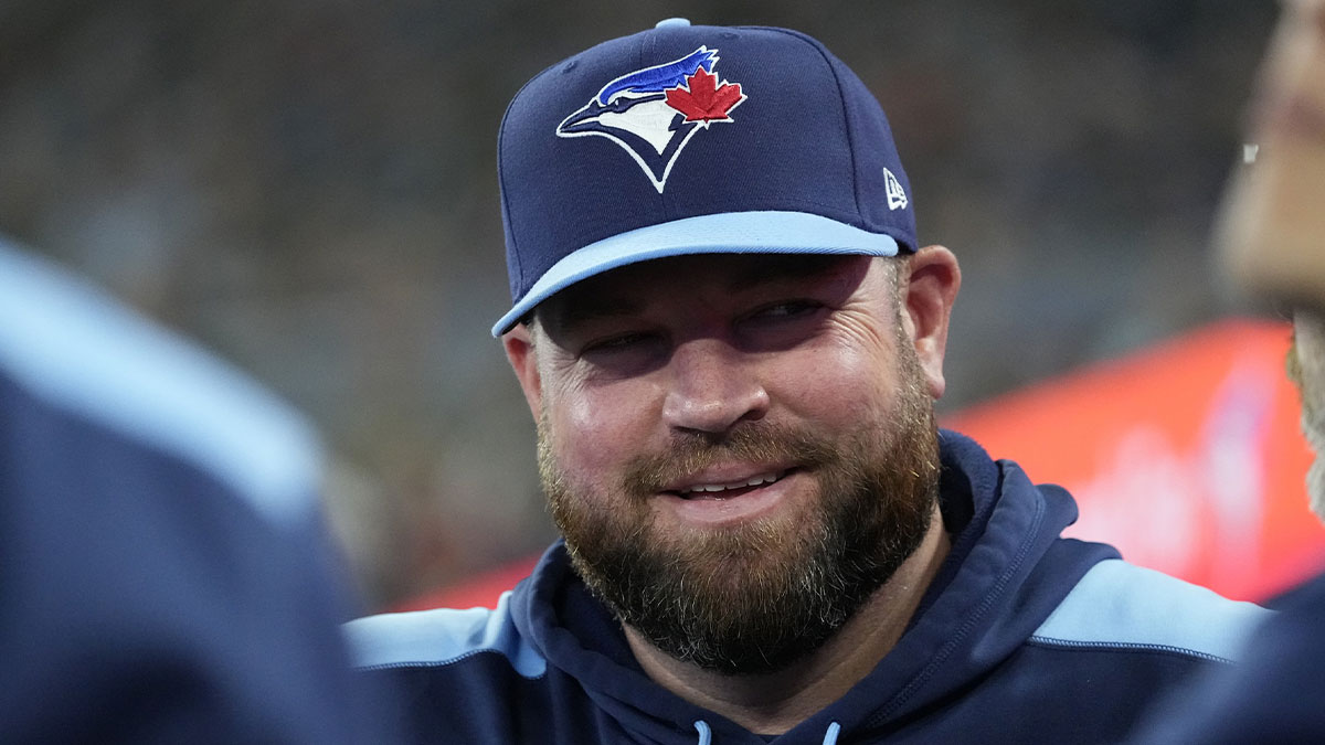 Toronto Blue Jays manager John Schneider smailes during the first inning of a game against the Athletics at Rogers Centre.