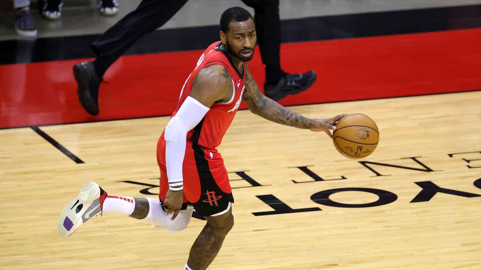 John Wall #1 of the Houston Rockets takes the ball up court during the second quarter of a game against the Los Angeles Lakers at Toyota Center on January 10, 2021 in Houston, Texas. 