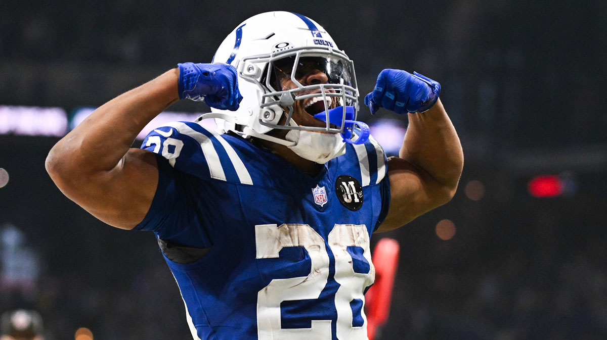 Indianapolis Colts running back Jonathan Taylor (28) celebrates after scoring a touchdown during the third quarter against the Tennessee Titans at Lucas Oil Stadium.