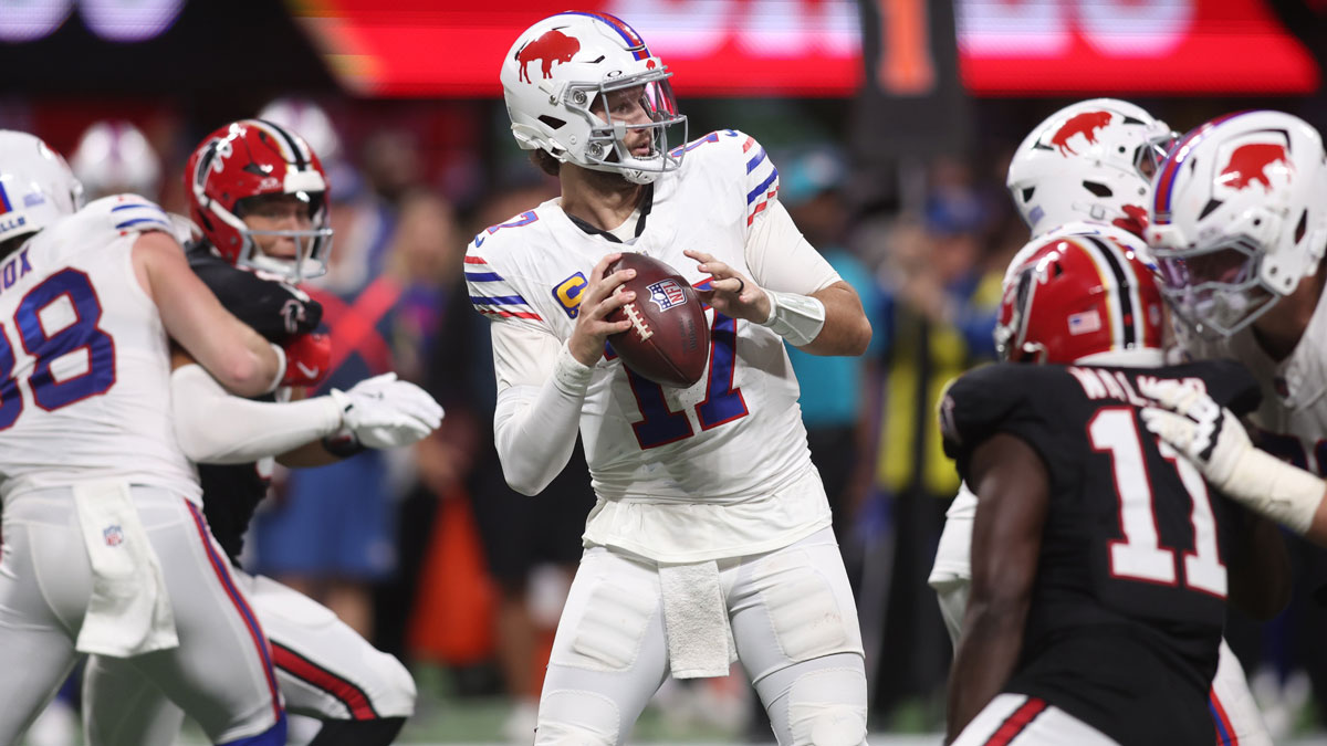 Buffalo Bills quarterback Josh Allen (17) stands in the pocket against the Atlanta Falcons during the second half of a game at Mercedes-Benz Stadium. 