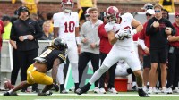 Alabama Crimson Tide tight end Josh Cuevas (80) avoids a tackle against Missouri Tigers cornerback Stephen Hall (0) during the first quarter of the game at Faurot Field at Memorial Stadium. Mandatory Credit: Reese Strickland-Imagn Images