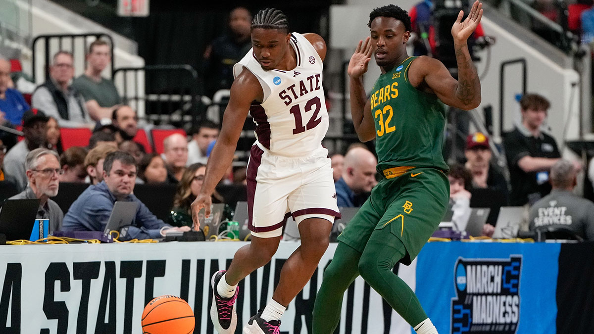 Mississippi State Bulldogs guard Josh Hubbard (12) and Baylor Bears guard Jalen Celestine (32) go after the ball during the first half in the first round of the NCAA Tournament at Lenovo Center.