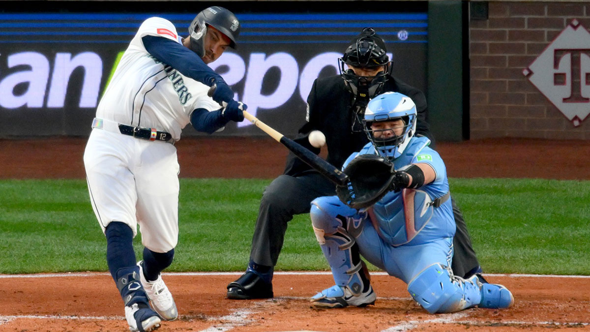 Seattle Mariners first baseman Josh Naylor (12) hits a home run in the second inning against the Toronto Blue Jays during game four of the ALCS round for the 2025 MLB playoffs at T-Mobile Park. 