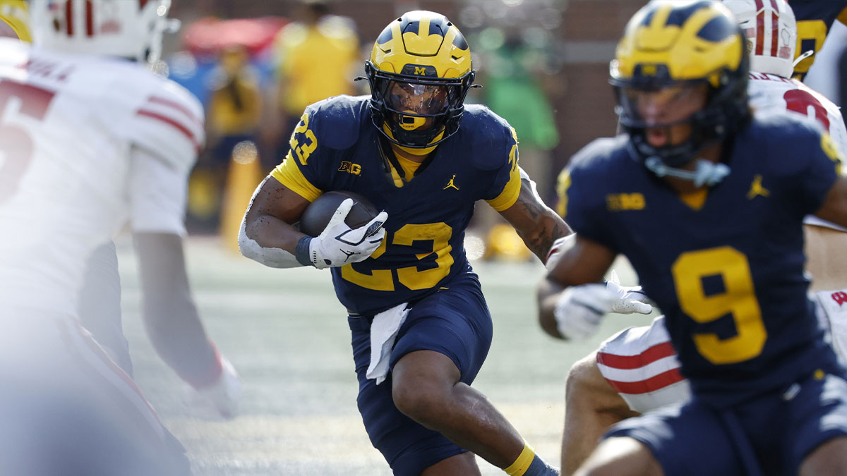 Michigan Wolverines running back Jordan Marshall (23) rushes in the second half against the Wisconsin Badgers at Michigan Stadium.