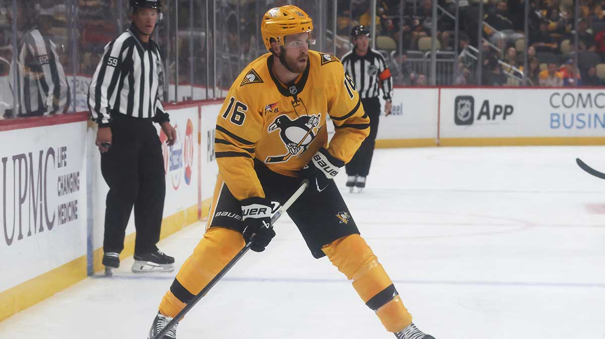 Pittsburgh Penguins right wing Justin Brazeau (16) skates with the puck against the New York Islanders during the first period at PPG Paints Arena.