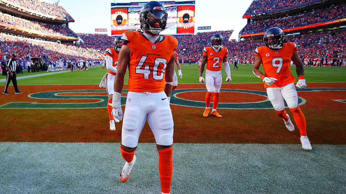 Denver Broncos linebacker Justin Strnad (40) celebrates after a touchdown during the second half against the New York Giants at Empower Field at Mile High.
