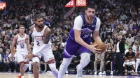 Utah Jazz center Jusuf Nurkic (30) save a ball against Phoenix Suns center Nick Richards (2) during the second half at Delta Center.