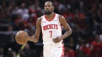 Houston Rockets forward Kevin Durant (7) brings the ball up the court during the third quarter against the Utah Jazz at Toyota Center.