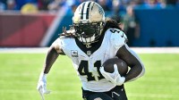New Orleans Saints running back Alvin Kamara (41) carries the ball against the Buffalo Bills in the third quarter at Highmark Stadium.
