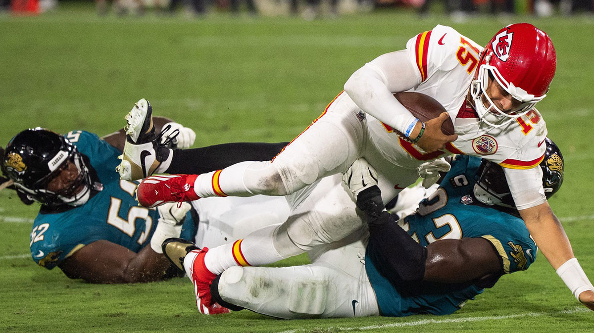 Jacksonville Jaguars linebacker Foye Oluokun (23) brings down Kansas City Chiefs quarterback Patrick Mahomes (15) in the third quarter during a Monday Night NFL football game at EverBank Stadium, Monday, Oct. 6, 2025, in Jacksonville, Fla. [Doug EngleFlorida Times-Union]