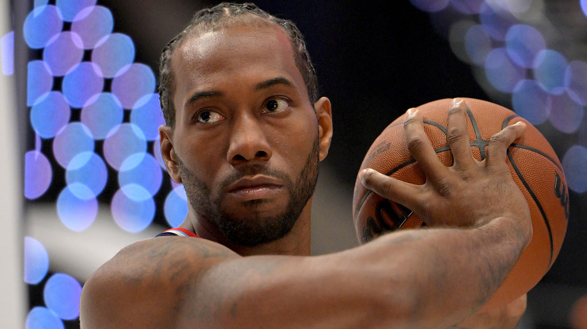 Los Angeles Clippers forward Kawhi Leonard (2) poses during media day at Intuit Dome.
