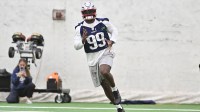 New England Patriots defensive end Keion White (99) does a drill during minicamp held in the WIN Field House at Gillette Stadium.