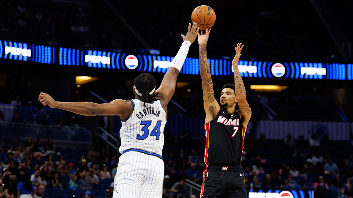 Miami Heat center Kel'El Ware (7) shoots over Orlando Magic center/forward Wendell Carter Jr. (34) during the first half at Kia Center.
