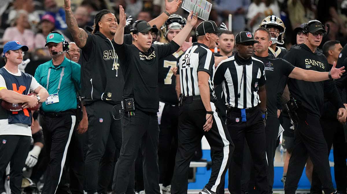 New Orleans Saints head coach Kellen Moore signals from the sideline against the New York Giants during the fourth quarter at Caesars Superdome.