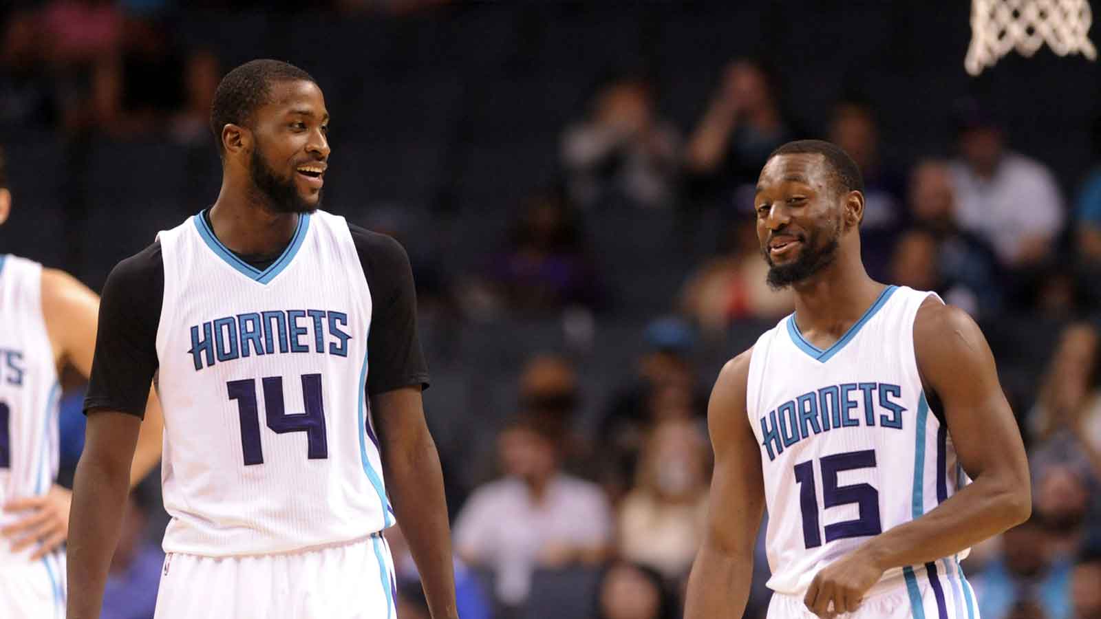 Charlotte Hornets forward Michael Kidd-Gilchrist (14) talks with guard Kemba Walker (15) during the second half of the game against the Miami Heat at the Spectrum Center. Hornets win 96-88.