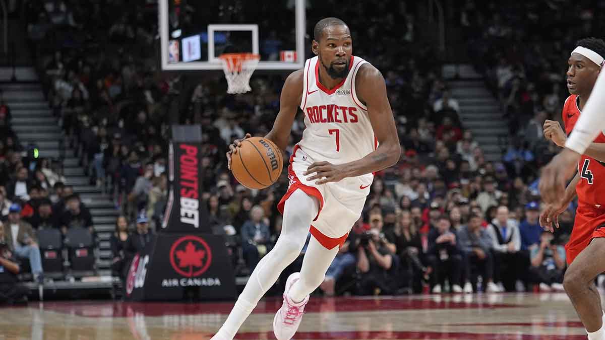 Houston Rockets forward Kevin Durant (7) dribbles the ball against the Toronto Raptors during the second half at Scotiabank Arena.