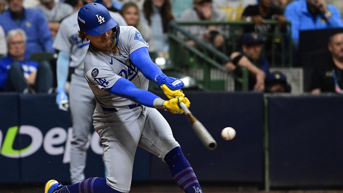 Los Angeles Dodgers left fielder Enrique Hernández (8) singles during the ninth inning against the Milwaukee Brewers during game one of the NLCS round for the 2025 MLB playoffs at American Family Field.