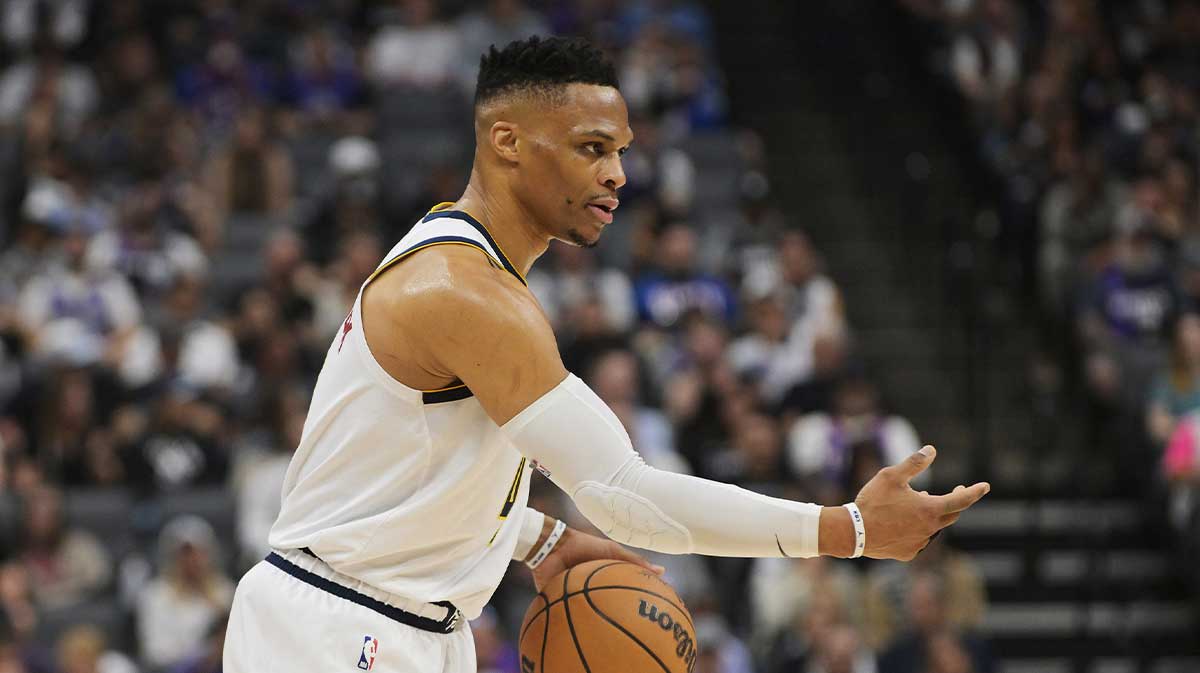 Nuggets guard Russell Westbrook (4) directs his team against the Sacramento Kings during the first quarter at Golden 1 Center