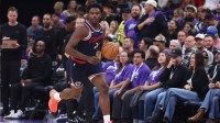 Los Angeles Clippers guard Kobe Brown (24) brings the ball up the court against the Utah Jazz during the second half at Delta Center.