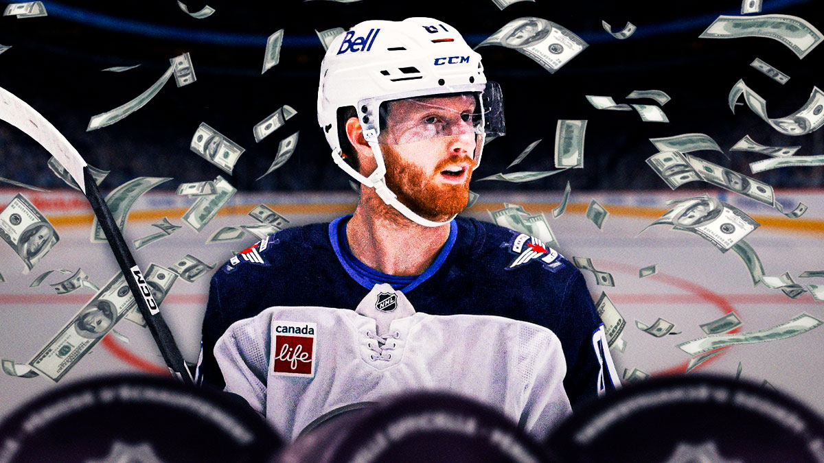 Kyle Connor surrounded by falling money