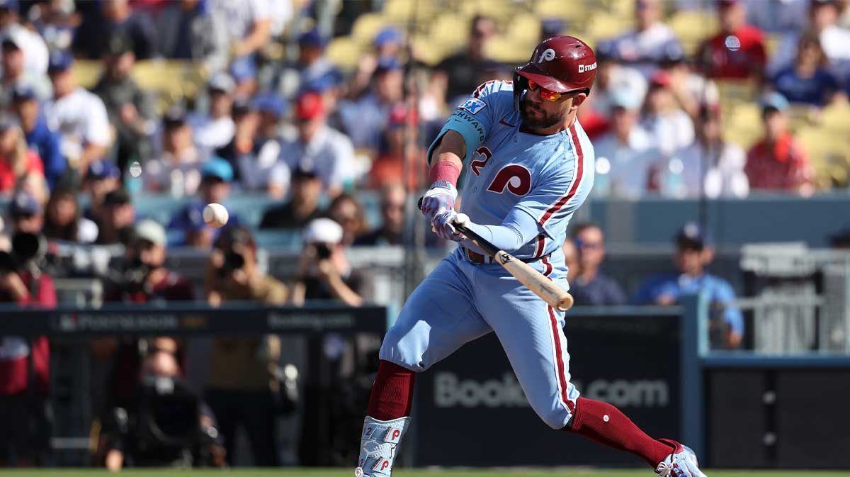 Philadelphia Phillies left fielder Kyle Schwarber (12) doubles in the first inning against the Los Angeles Dodgers during game four of the NLDS round for the 2025 MLB playoffs at Dodger Stadium.