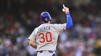 Chicago Cubs outfielder Kyle Tucker (30) hits a two-run home run against the Los Angeles Angels during the third inning at Angel Stadium.