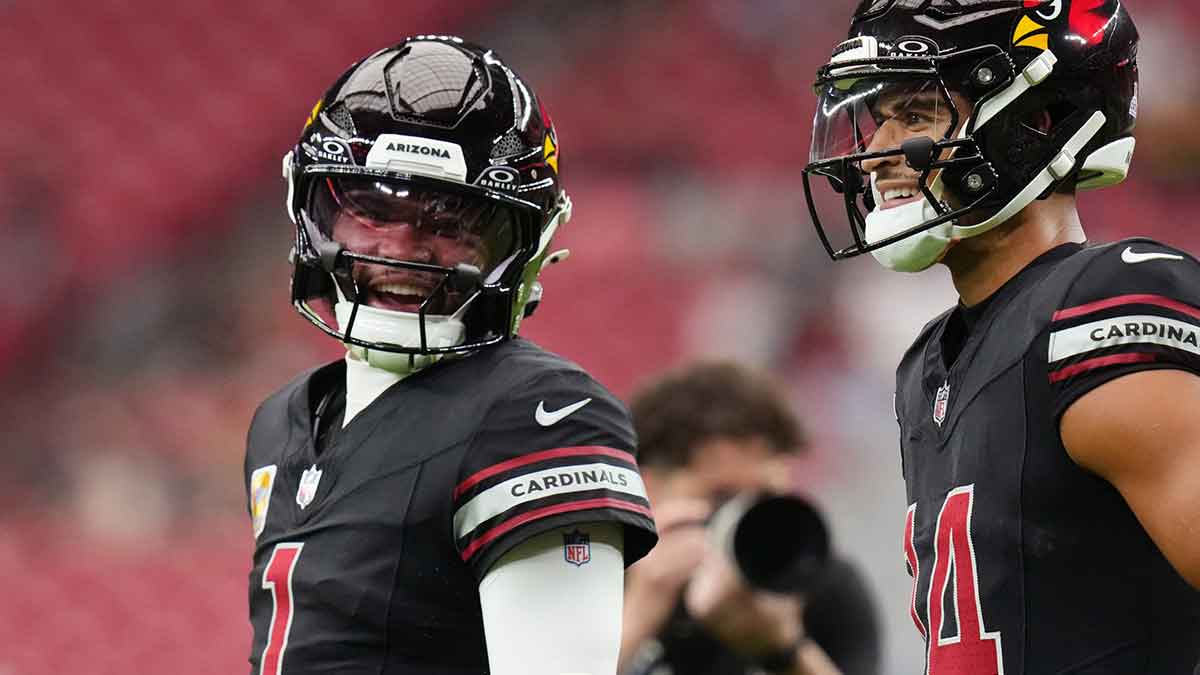 Arizona Cardinals quarterback Kyler Murray (1) chats with teammate Michael Wilson (14) before their game against the Tennessee Titans at State Farm Stadium in Glendale on Oct. 5, 2025.