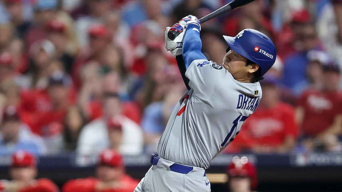 Los Angeles Dodgers designated hitter Shohei Ohtani (17) hits an RBI single against the Philadelphia Phillies in the seventh inning during game two of the NLDS round for the 2025 MLB playoffs at Citizens Bank Park.