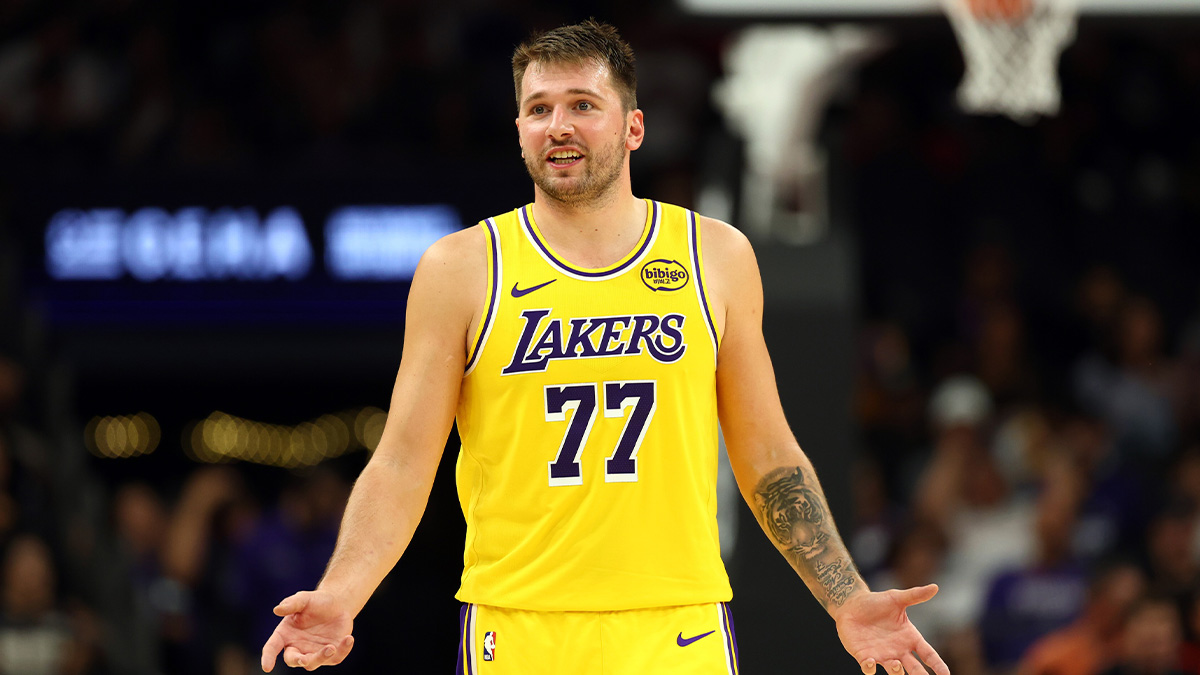 Los Angeles Lakers guard Luka Doncic (77) against the Phoenix Suns during an NBA preseason game at Mortgage Matchup Center.