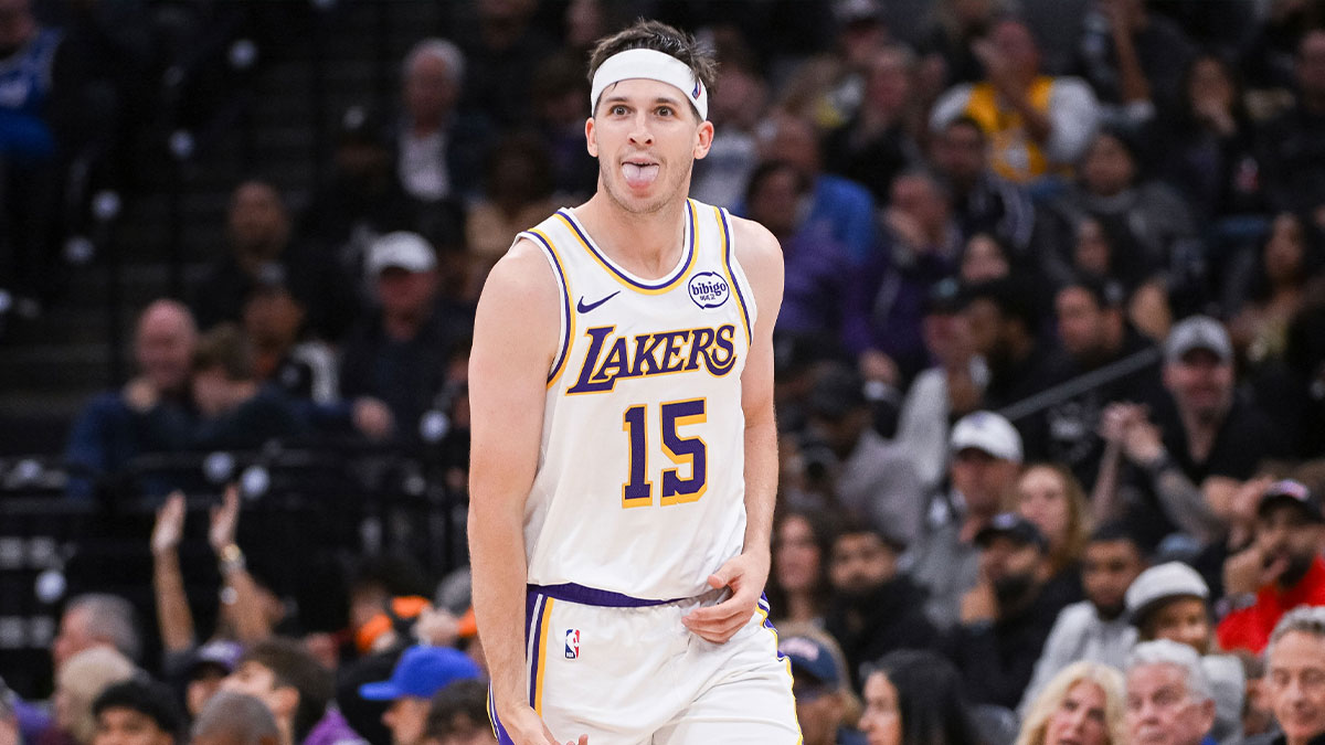 Lakers guard Austin Reaves (15) reacts