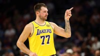 Lakers guard Luka Doncic (77) reacts